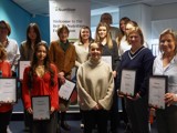A photo of teachers and pupils at the Education Conference, with their awards